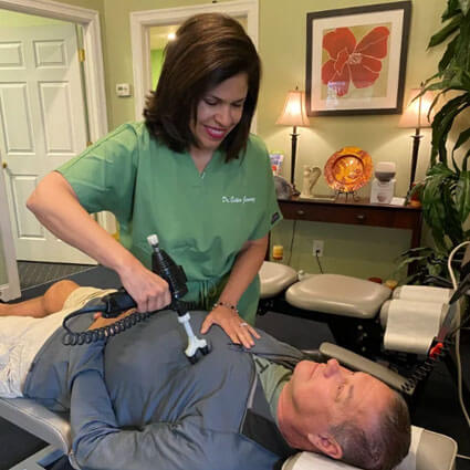 Adjusting man on table